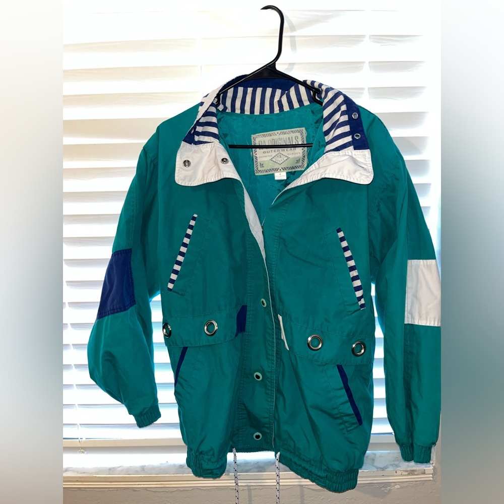 Woman’s teal jacket